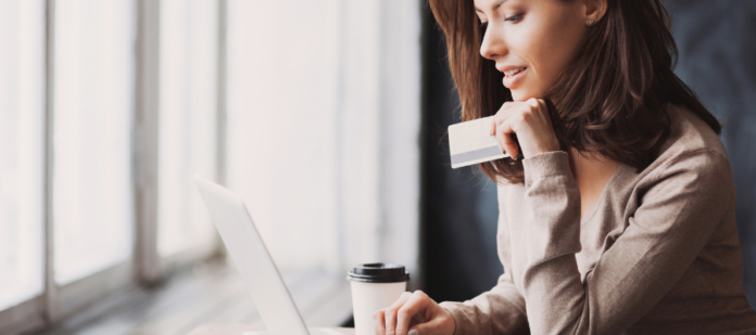 woman paying online with credit card