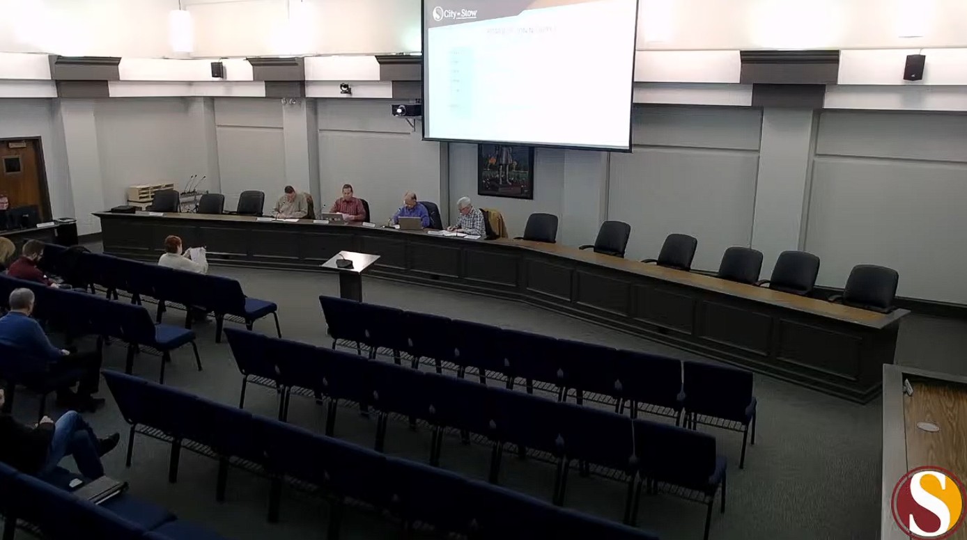 Stow BZA Approves Variances for Fire-Damaged Units and Unique Fence Request